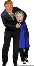 Load image into Gallery viewer, Donald Trump giving a Hillary a headlock Cardboard Cutout 72&quot; Tall